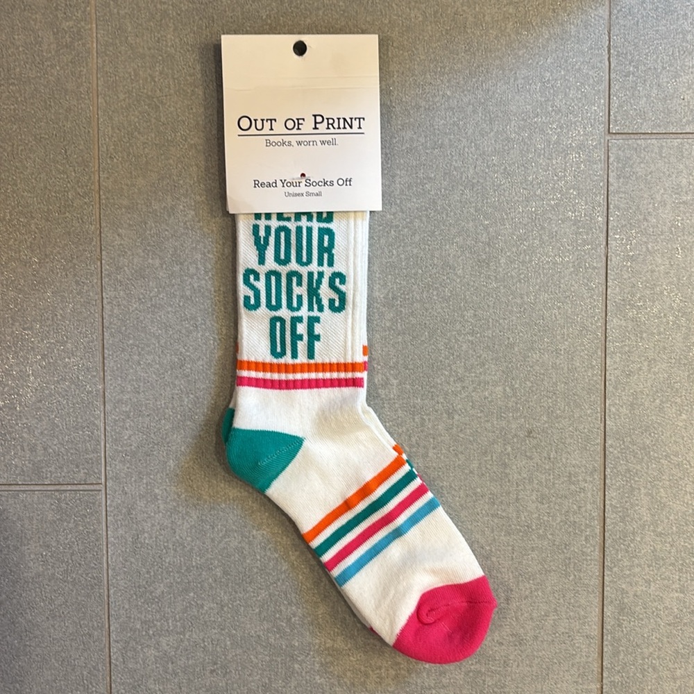 NWT Out of Print “Read Your Socks Off” socks in unisex size small